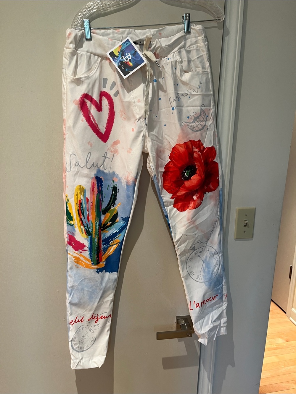 White Hand-Painted Style Joggers with Colorful Floral & Heart Accents